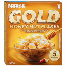 Хлопья Nestle Gold Flakes хрустящие кукурузные с медом и арахисом 300 г